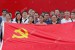 file-chinese-members-of-the-communist-party-of-china-cpc-pose-with-a-party-flag-to-celebra